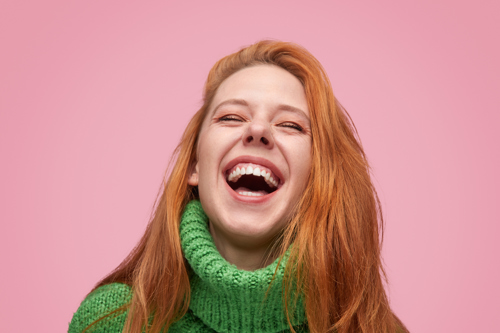 Close up of woman smiling and laughing